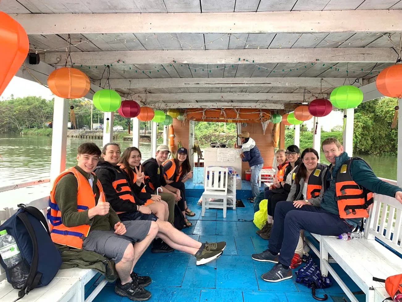 Warm wooden interior with lantern light in Hoi An.