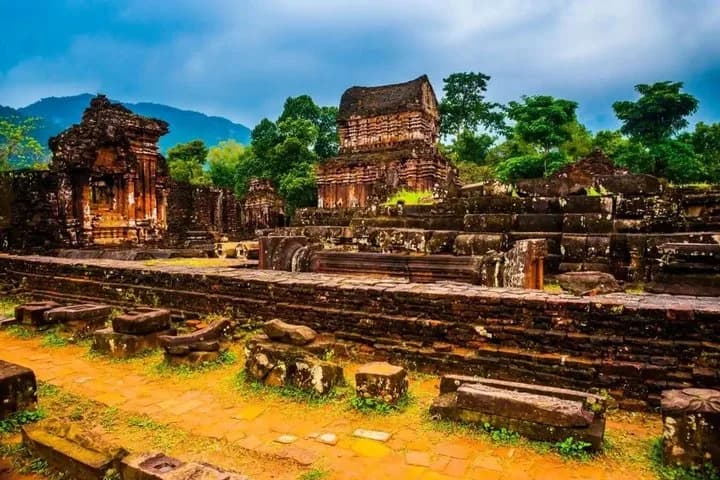 Sunrise light over an ancient Cham brick temple at My Son Sanctuary during a Fingo private tour.