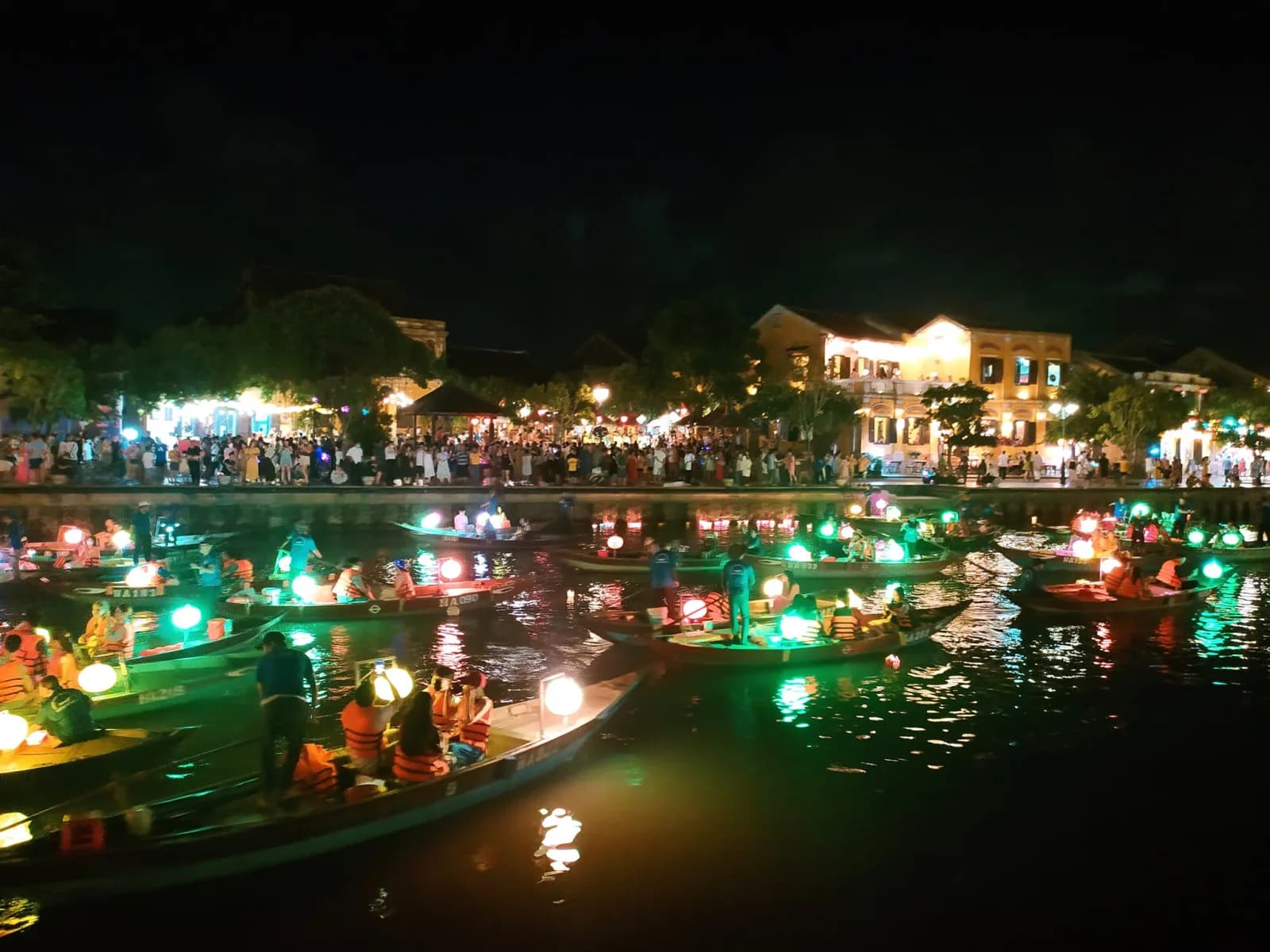 A night boat ride along the lit-up old town on the Hoai River to end the food tour.