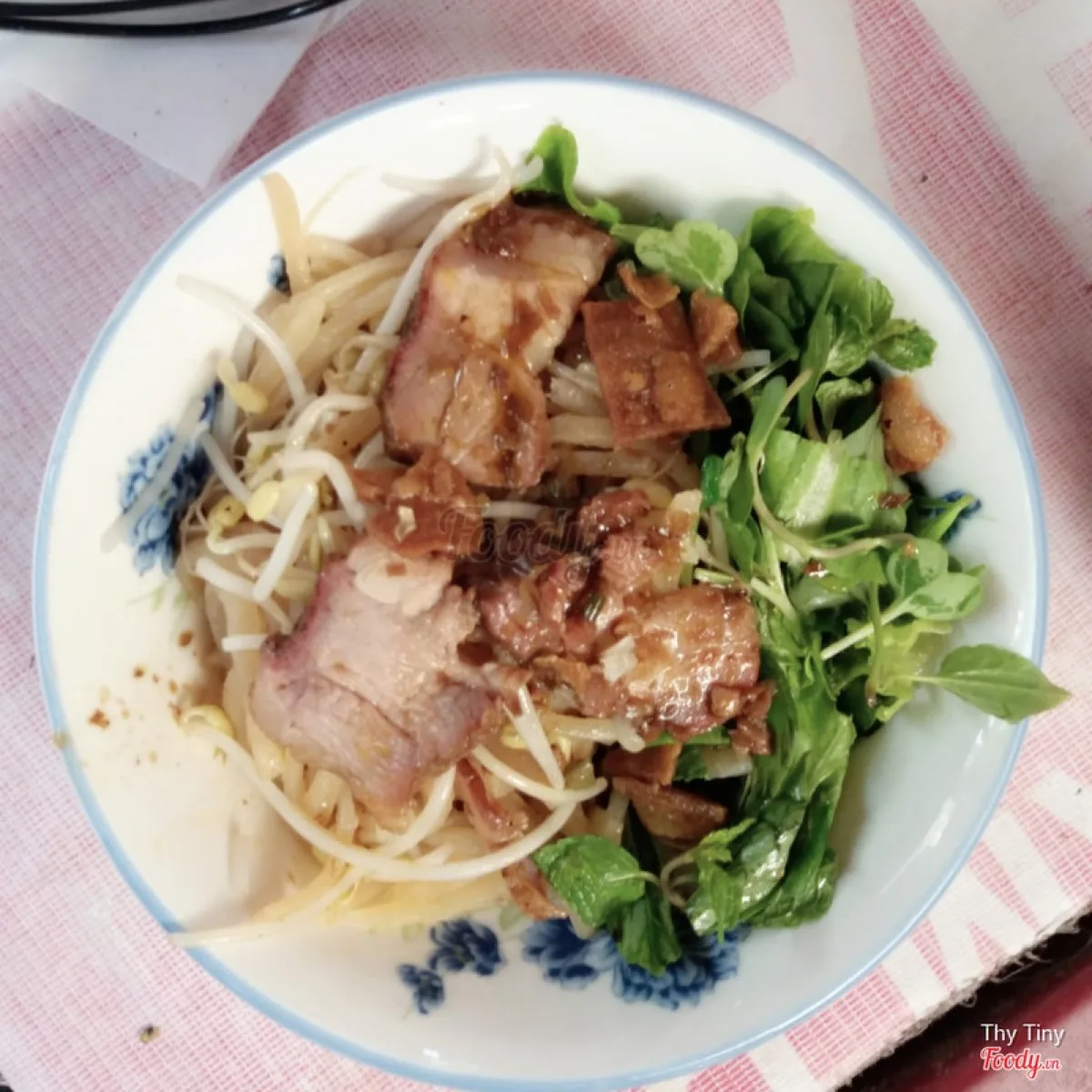 Cao lầu broth and pork belly close-up