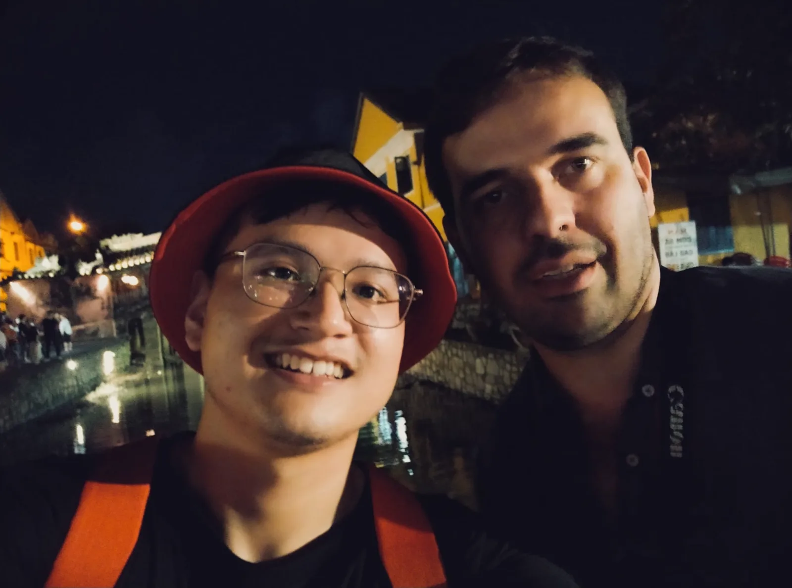 Fin with a guest during a private evening walk along the Hoai River in Hoi An.